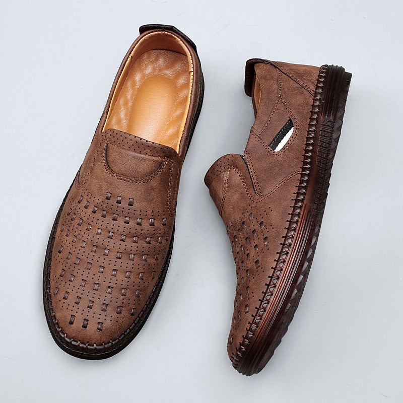 Pair of brown perforated slip-on shoes with stitched soles, top view