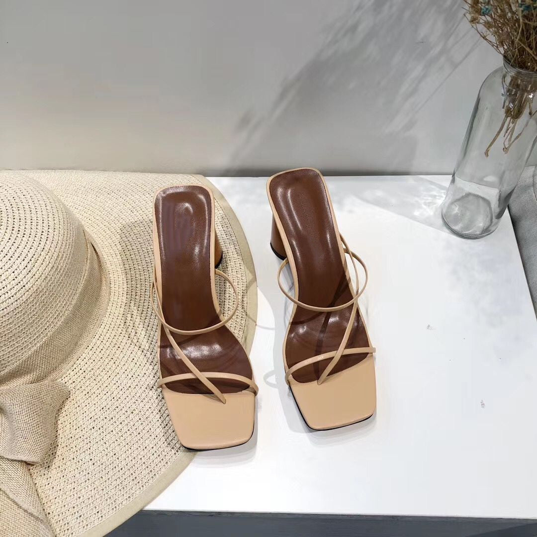 Pair of nude strappy square-toe block-heel sandals, top view