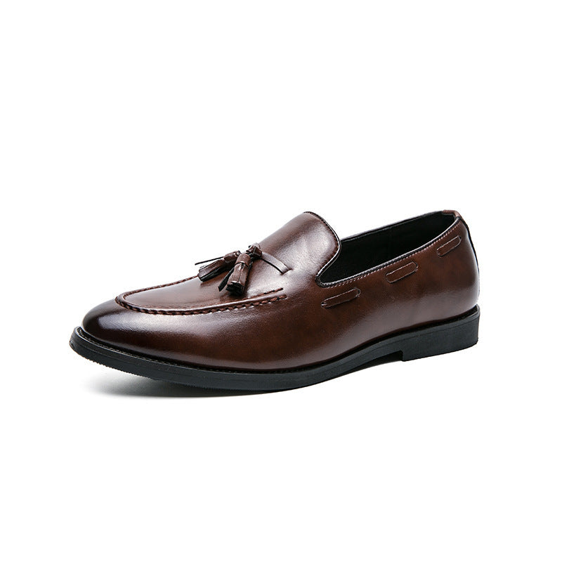 Brown tassel loafer, side view