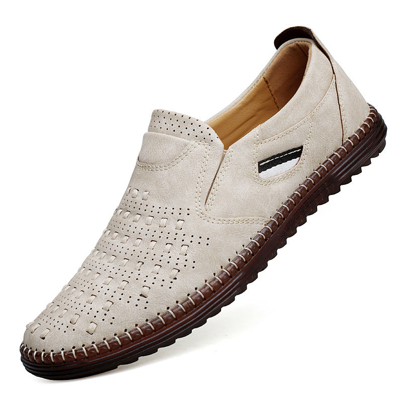 Beige perforated slip-on shoe with stitched sole, angled view