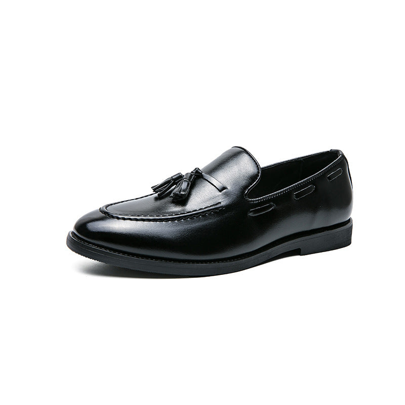 Black tassel loafer, side view