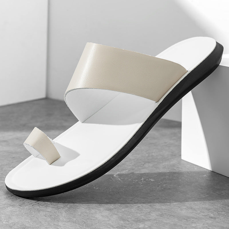 White toe-loop slide sandal with a wide asymmetric strap