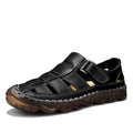 Black closed-toe fisherman sandal, side view