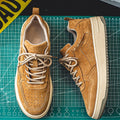 Tan brushed court sneakers from above and side