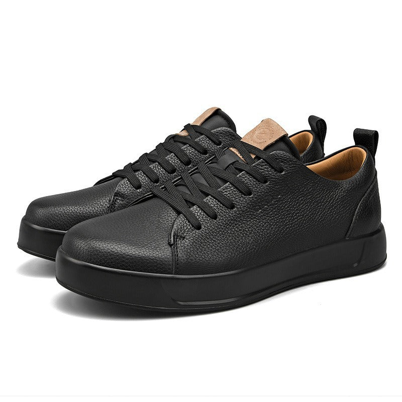 Pair of black leather low-top court sneakers