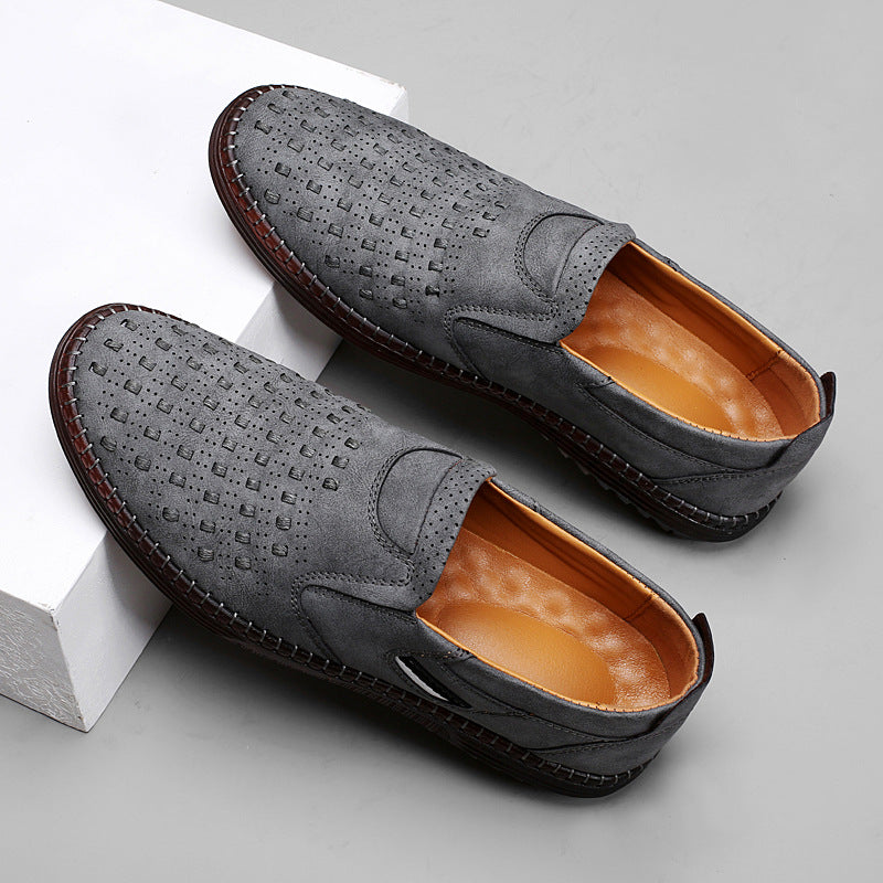 Pair of gray perforated slip-on shoes showing the padded lining
