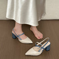 Two-tone cream slingback with contrast blue strap and block heel
