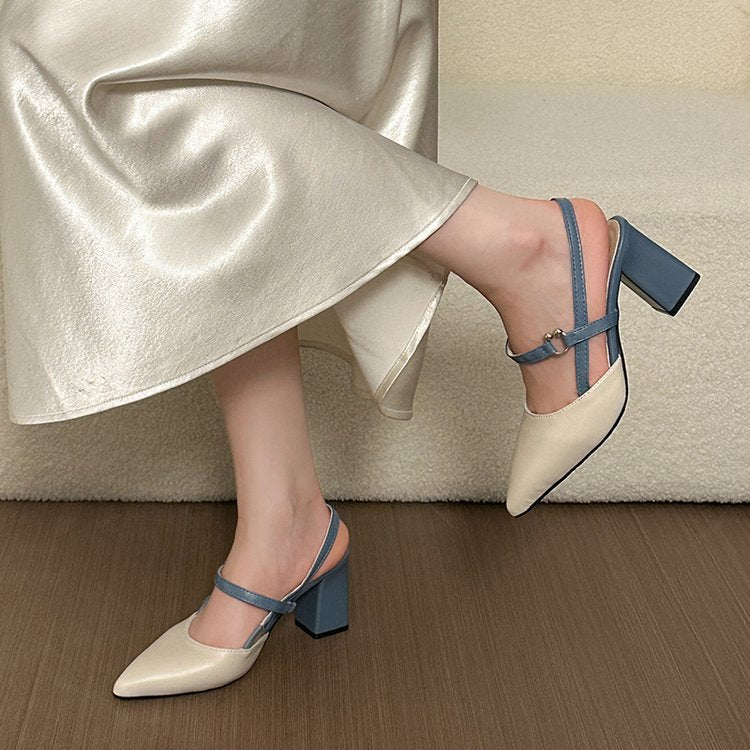 Side view of a cream and blue block-heel slingback worn on foot
