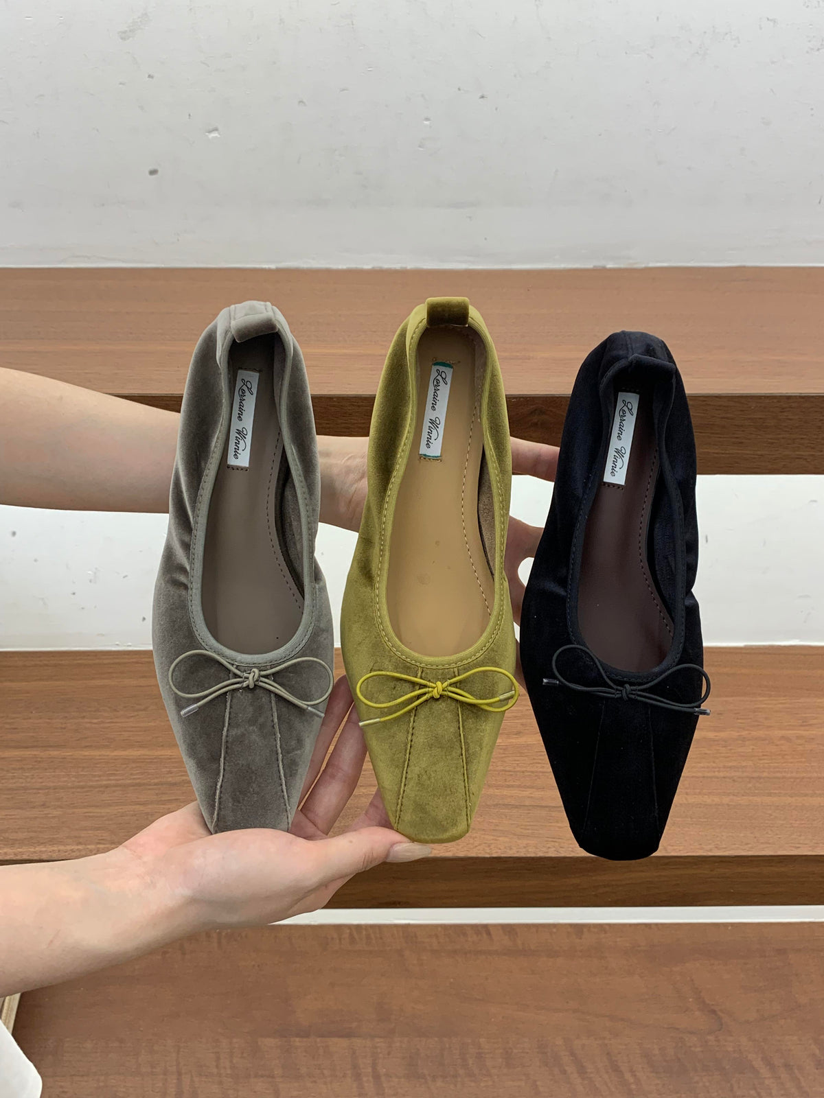 Gray, olive and black square-toe bow ballet flats, top view