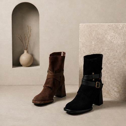Brown and black suede ankle boots with wrap buckle straps and block heels