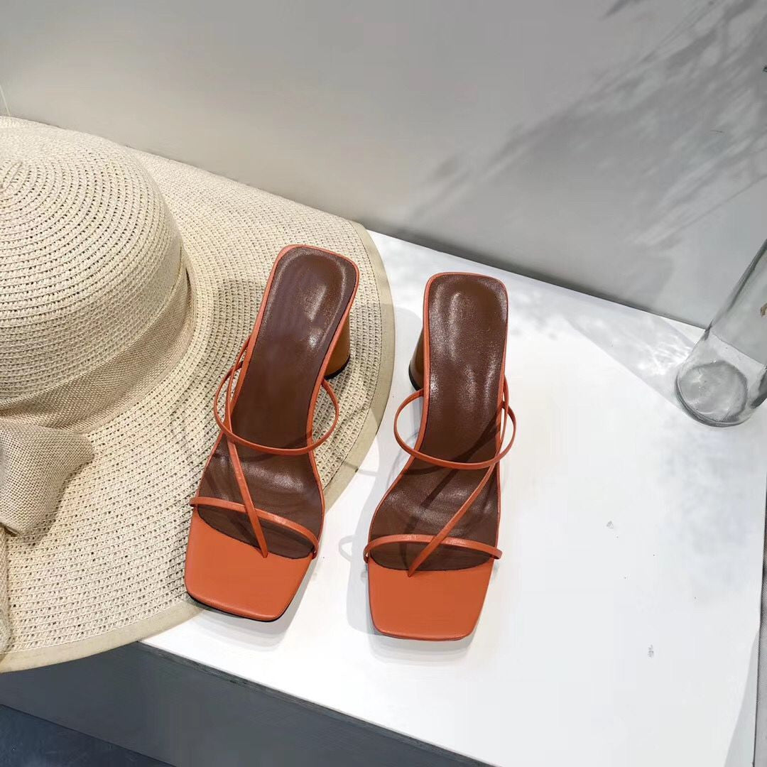 Pair of terracotta strappy square-toe block-heel sandals, top view